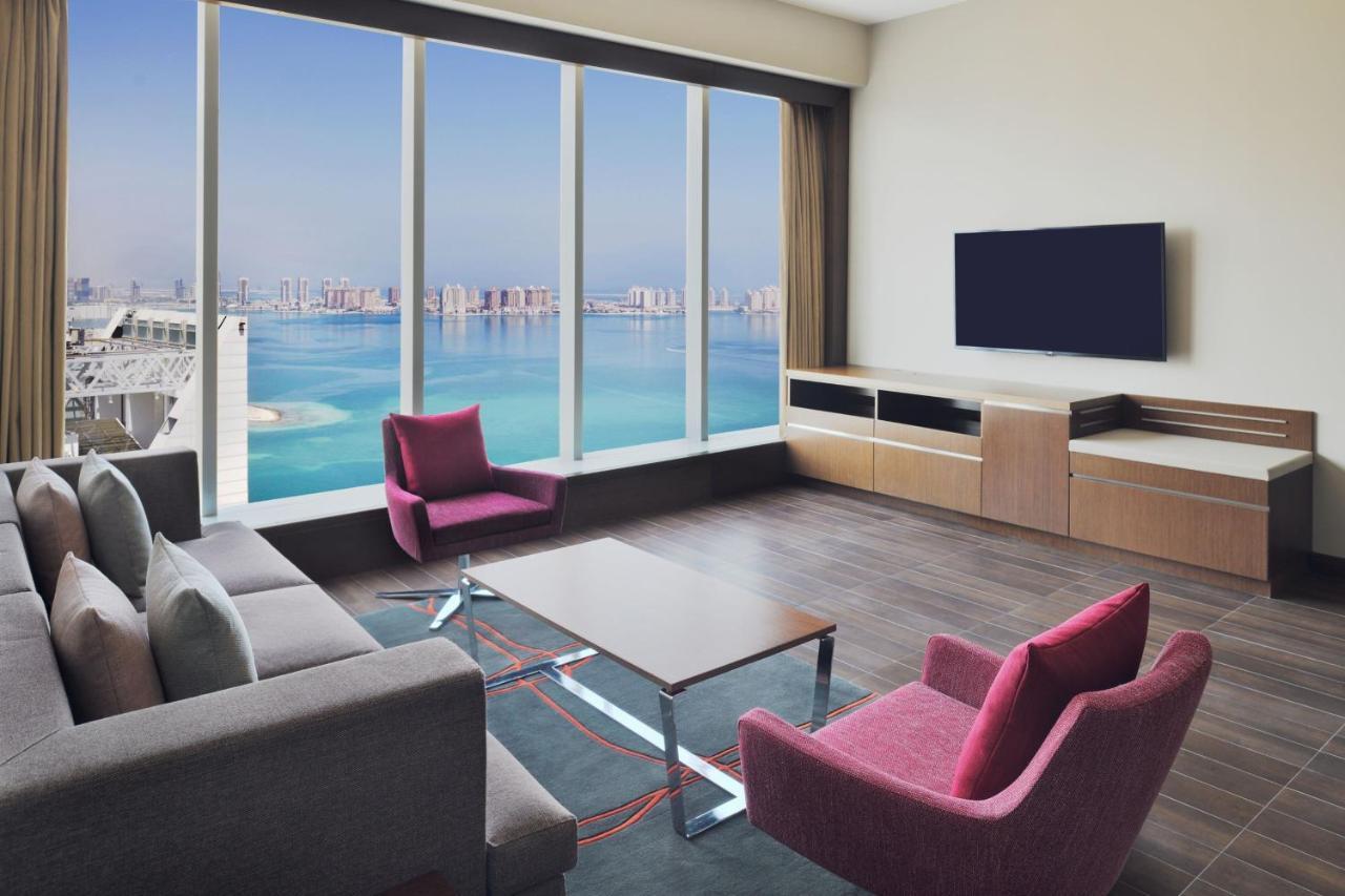 Delta Hotels By Marriott City Center Doha Exterior photo A living room in a typical apartment
