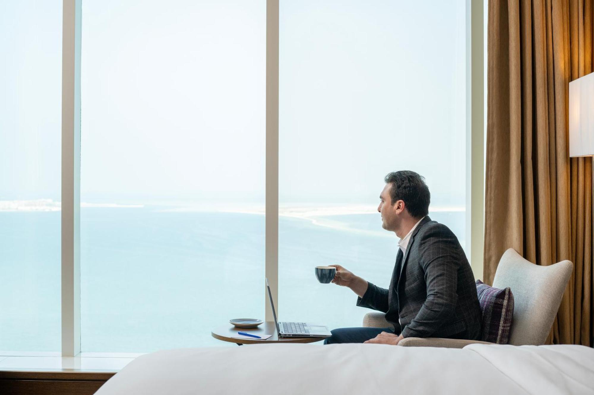 Delta Hotels By Marriott City Center Doha Exterior photo A guest enjoying the view from a room at the hotel
